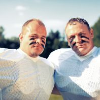 american football players posing